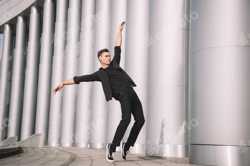 Young Man Dancing in an Urban Environment