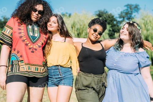 Preview: Friends posing in park