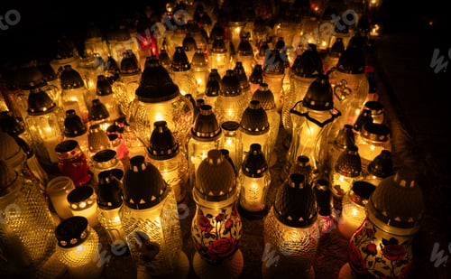 Preview: Candles on graves during All Saints' Day in Poland