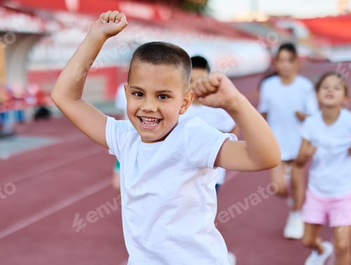 Preview: Children having sport exercise training class outdoors