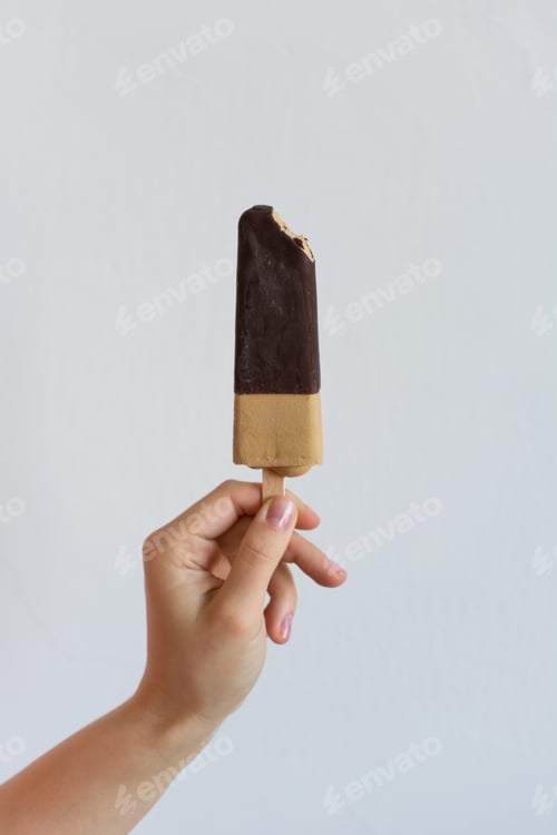 Preview: Holding chocolate popsicle