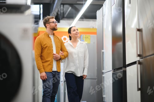 Preview: young couple choose new refrigerator