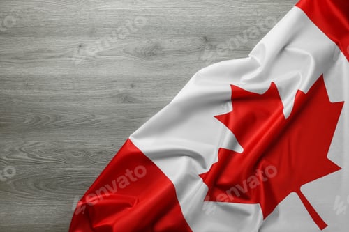 Preview: Flag of Canada on wooden table, top view. Space for text