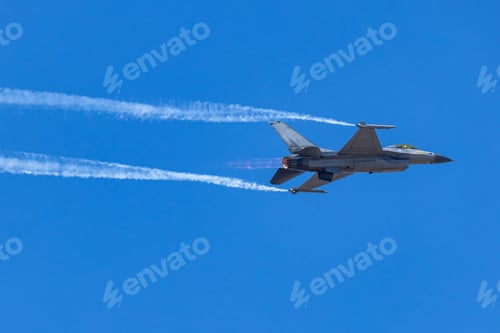 Preview: Fighter Jet Climbing with Vapor Trail in Sky