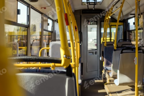 Preview: selective focus of empty city bus interior with seats