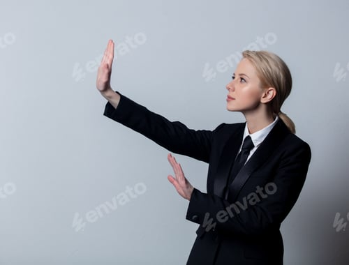 Preview: businesswoman in a classic black business suit