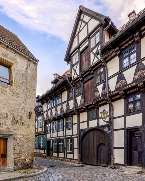 Preview: Cobblestone street in Quedlinburg lined with historical buildings