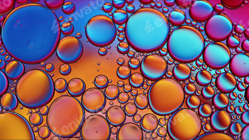 Preview: Abstract Colorful Food Oil Drops Bubbles and spheres Flowing on Water Surface