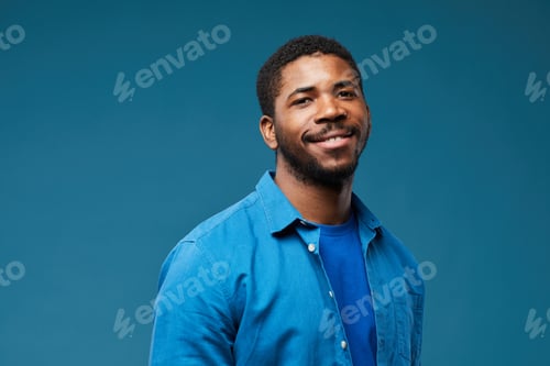 Preview: Smiling Black Man on Blue