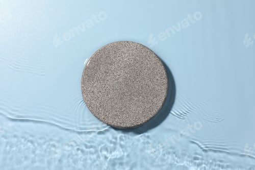 Preview: Presentation for product. Stone podium in water on light blue background, top view