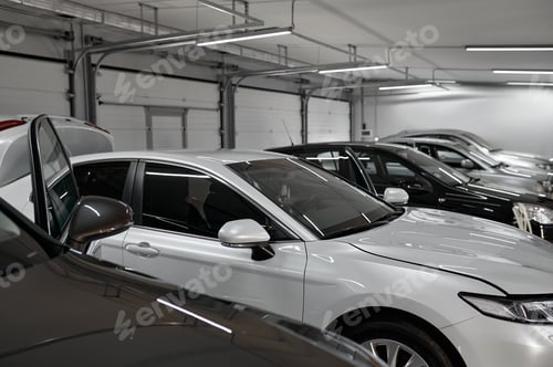 Preview: Different painted car drying in repair shop