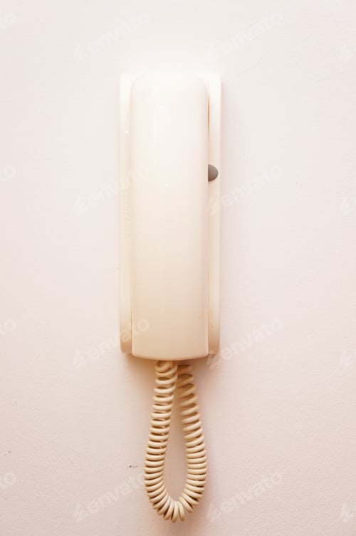 Preview: Vertical shot of an interphone handset intercom system