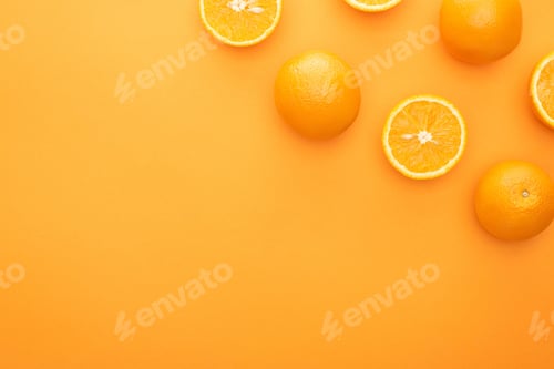 Preview: top view of ripe juicy whole oranges and slices on colorful background
