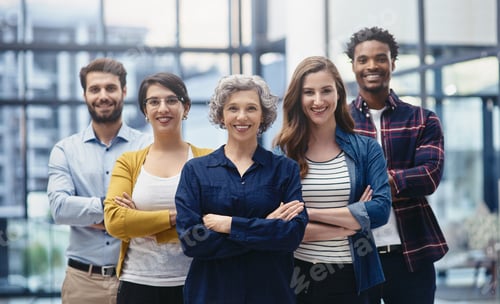 Preview: Portrait of a group of creatives standing with their arms folded in an office