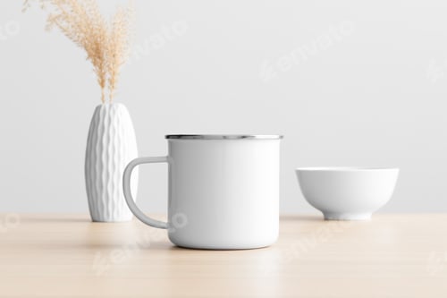 Preview: Enamel mug mockup with a dry flower decoration on the wooden table.