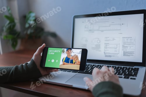 Preview: Delivery man ringing door bell on cctv secure camera system on mobile phone app