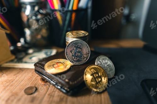 Preview: Bitcoin coins on a wooden desk at home