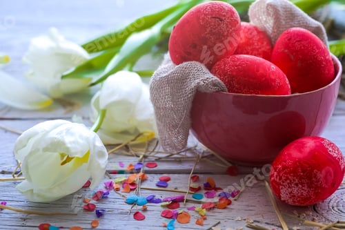 Preview: Easter still life with colored eggs in a plate and white tulips