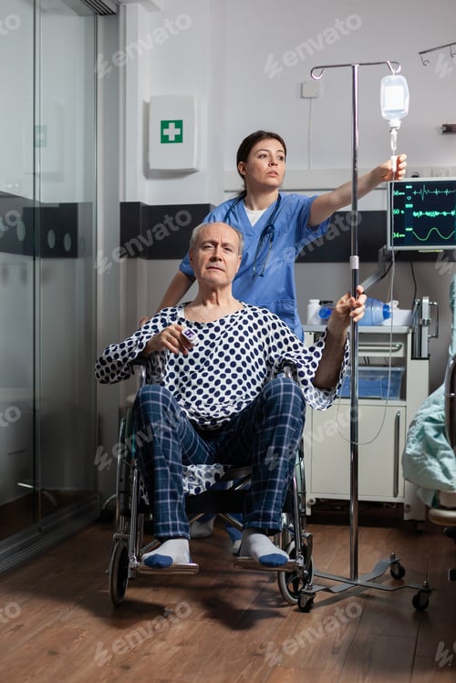 Preview: Medical practitioner preparing senior sick hospitalized man