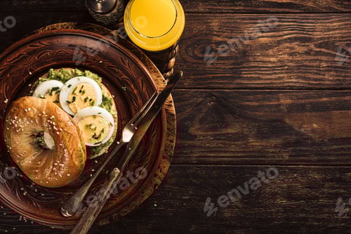 Preview: Bagel with Avocado, Egg and Orange Juice