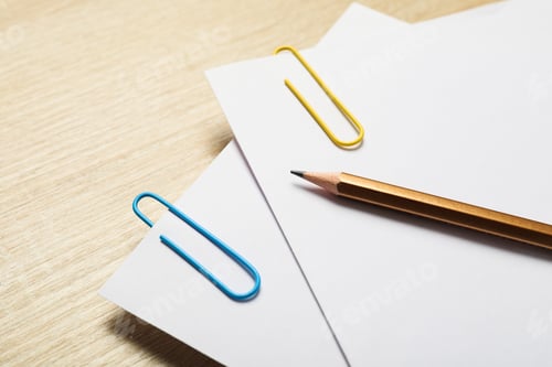 Preview: Concept of different office accessories - paper with clip