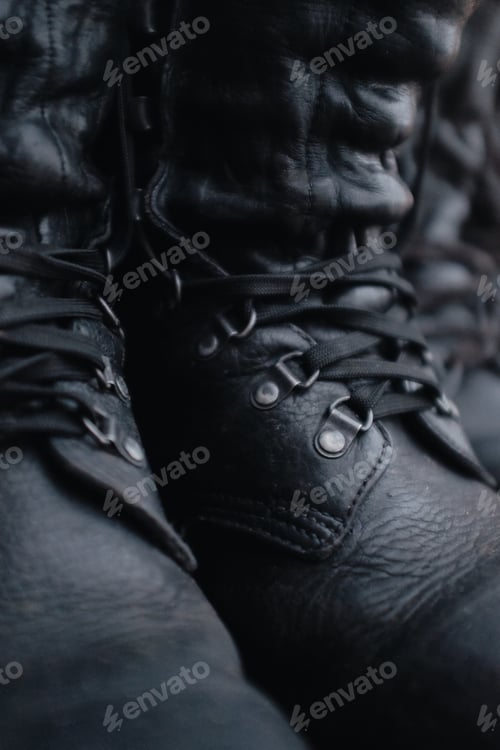 Preview: closeup of a black military leather combat boots