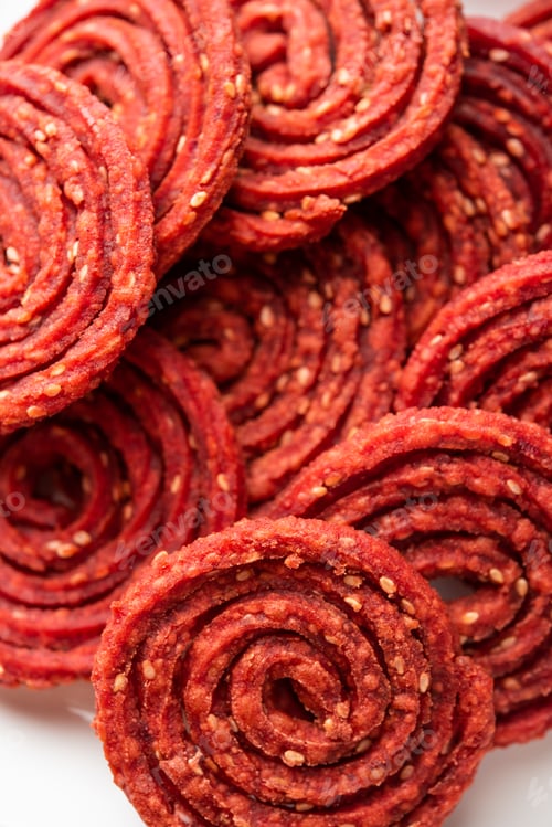 Preview: Beatroot chakli, murukku, Beetroot chakli, a spiral fried snack from India made in Diwali festival