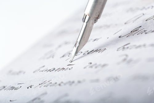 Preview: Writing with a fountain pen on a blank sheet of paper in a bright setting