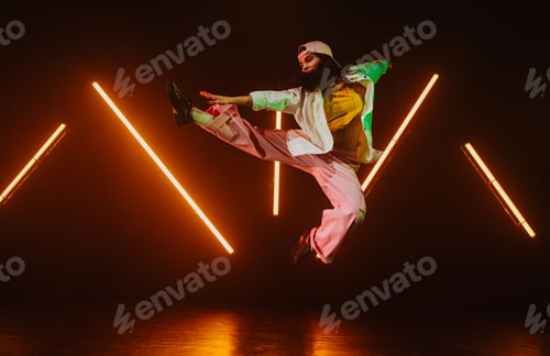 Preview: Hip hop dancer dancing in a cool studio with neon lights.