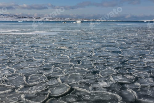 Preview: Huge ice blocks on water