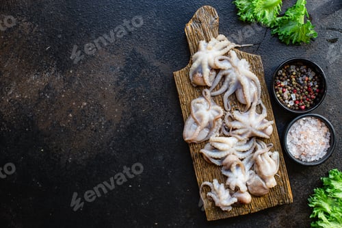 Preview: Octopus Raw Seafood Fresh Baby Size On The Table Serving Size Top View Copy Space For Text Diet