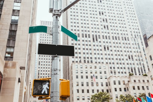 Preview: urban scene with traffic light, road signs and architecture of new york city, usa