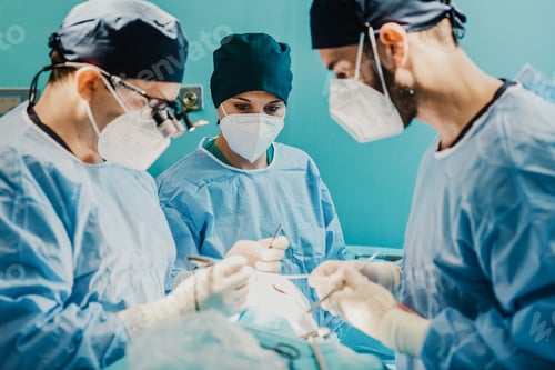 Preview: Medical doctors team operating patient in surgical room at hospital - Focus on nurse woman face
