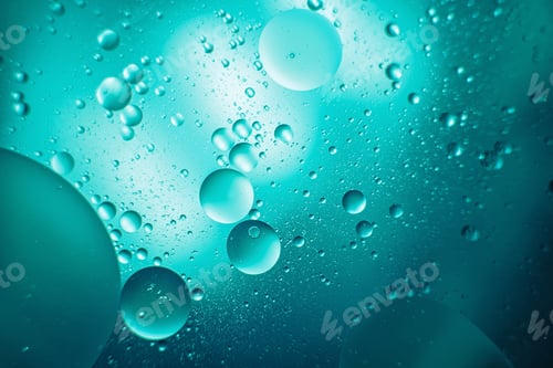 Preview: oil with bubbles on on dark blue background. Abstract background.