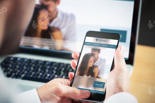 Preview: Businessman Using Smartphone Against Dating Website