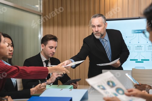 Preview: diverse business team leader discuss financial paperwork, Smart businessman and businesswoman