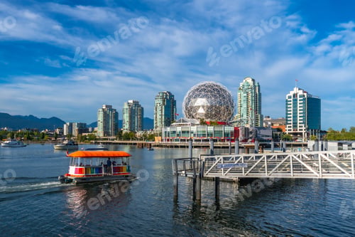 Preview: Ferry approaching science world and vancouver skyline in british columbia