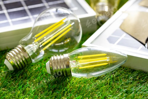 Preview: Solar energy panel and light bulb, green energy