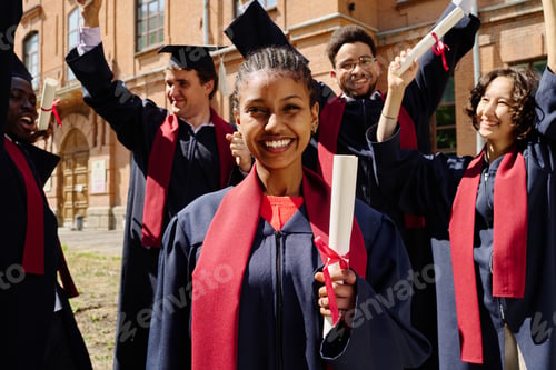 Preview: Happy graduated student with diploma