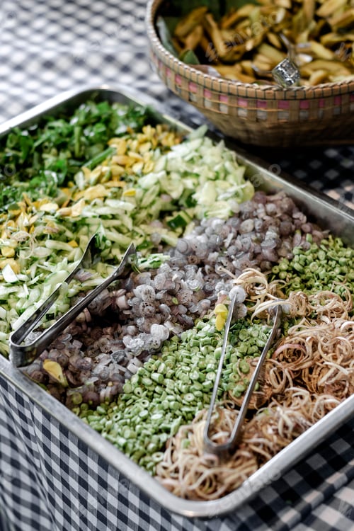 Preview: mixed cambodian vegetables on restaurant buffet table in Siem Reap