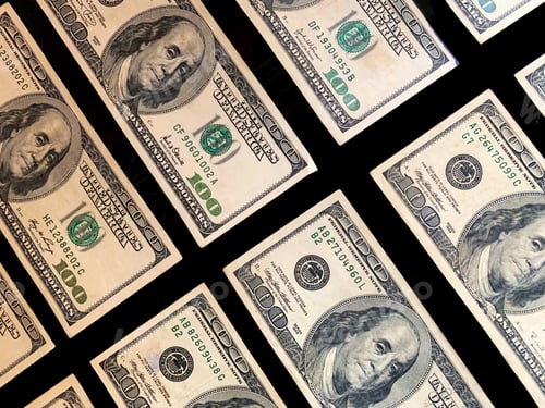 Preview: Arrangement of One Hundred Dollar Bills on Black Background