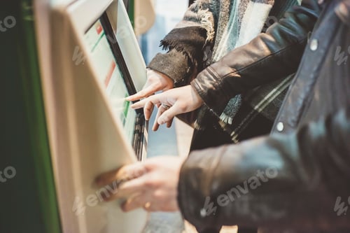 People Using a Digital Touch Screen Kiosk
