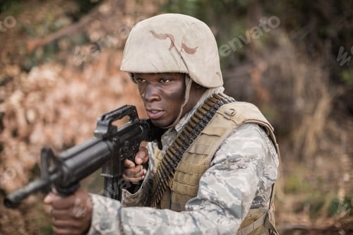Preview: Military soldiers during training exercise with weapon