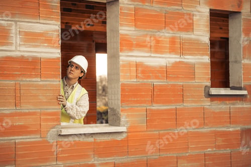 Preview: Professional Engineer Architect Worker With Protective Helmet At House Building Construction Site