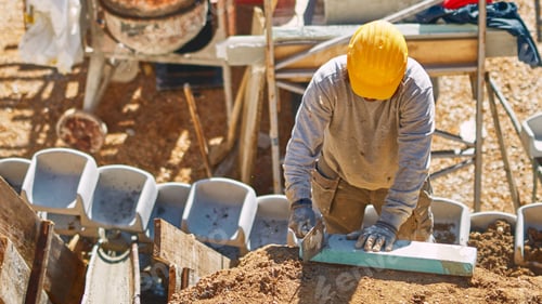 Preview: Construction Worker On A Heavy Site Doing Hard Work.