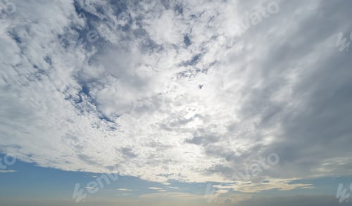 Preview: Sunset sky. Abstract nature background. Dramatic blue and orange, colorful clouds at twilight time.