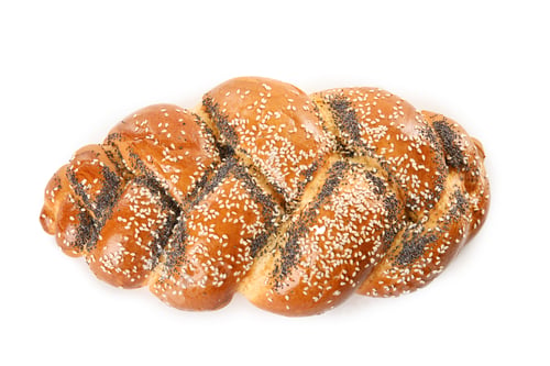 Preview: Sweet plaited challah on white background, top view. Fresh bread