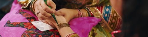Preview: Mom Drawing Henna For Her Child