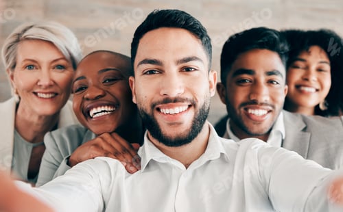 Preview: They have my back and I have theirs. Shot of a group of businesspeople taking a selfie at work.