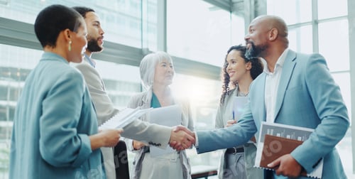 Preview: Business people, handshake and meeting in b2b, agreement or deal for teamwork or growth at office.